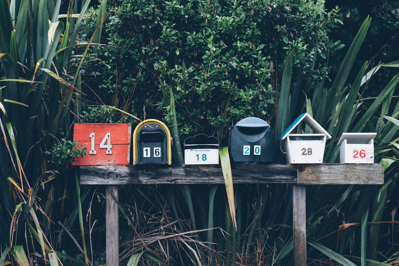 A row of colorful mailboxes