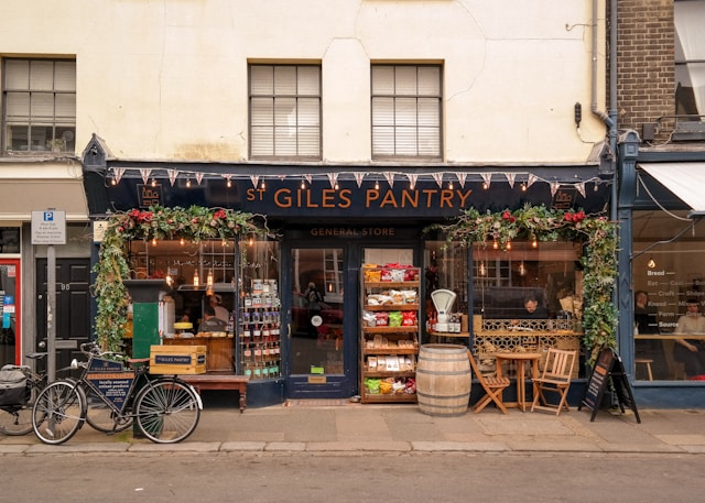A charming local café or restaurant scene representing neighborhood recommendations for Airbnb guests