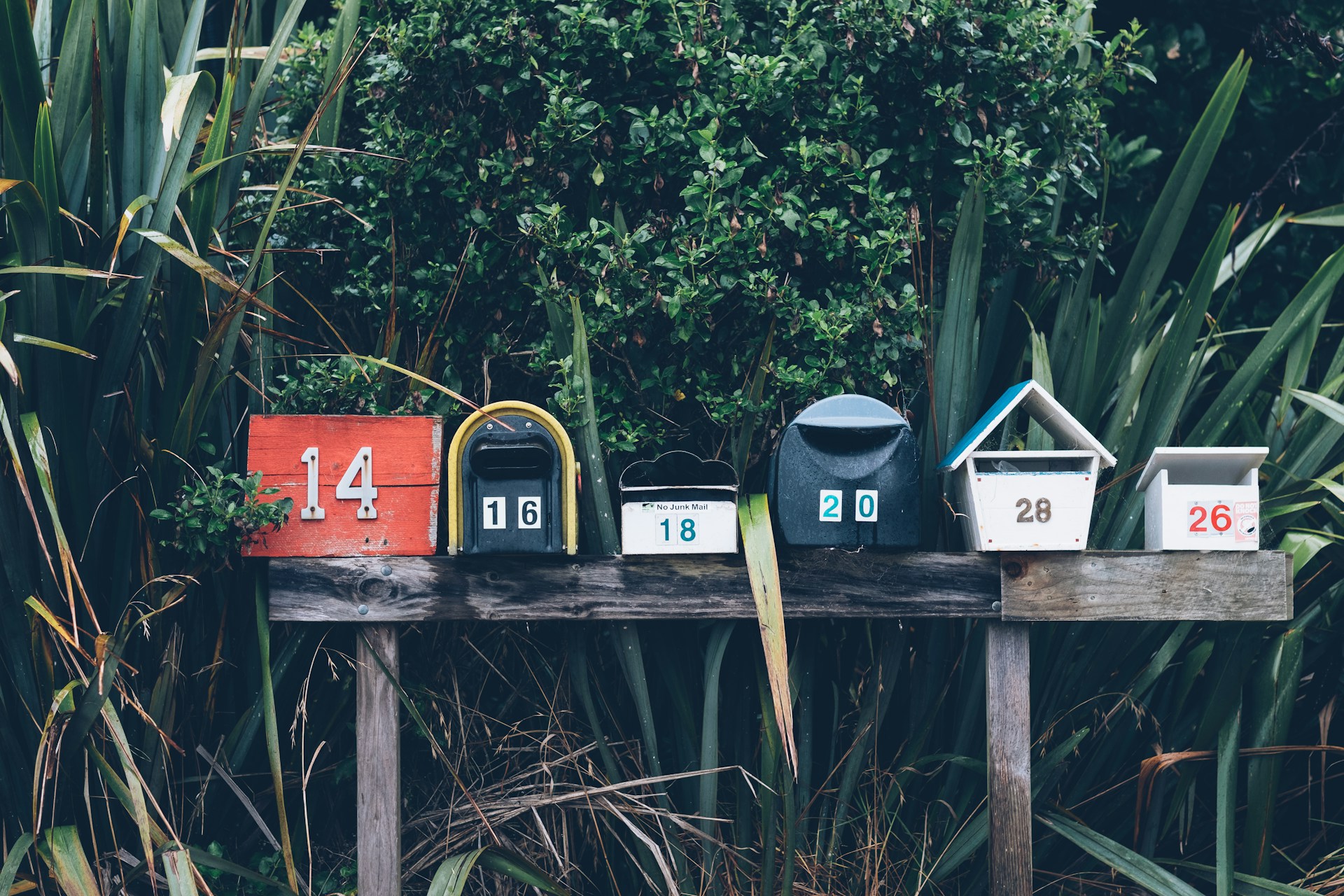 A row of colorful mailboxes